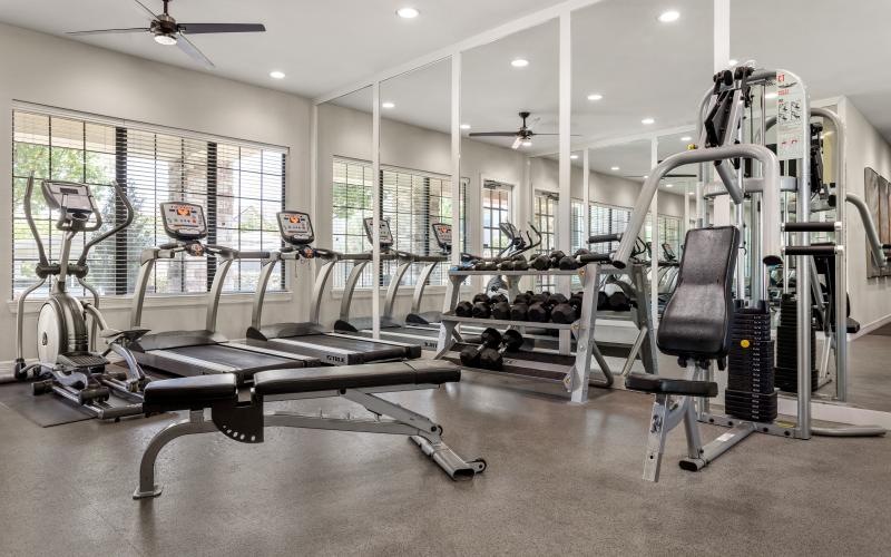 a gym with treadmills